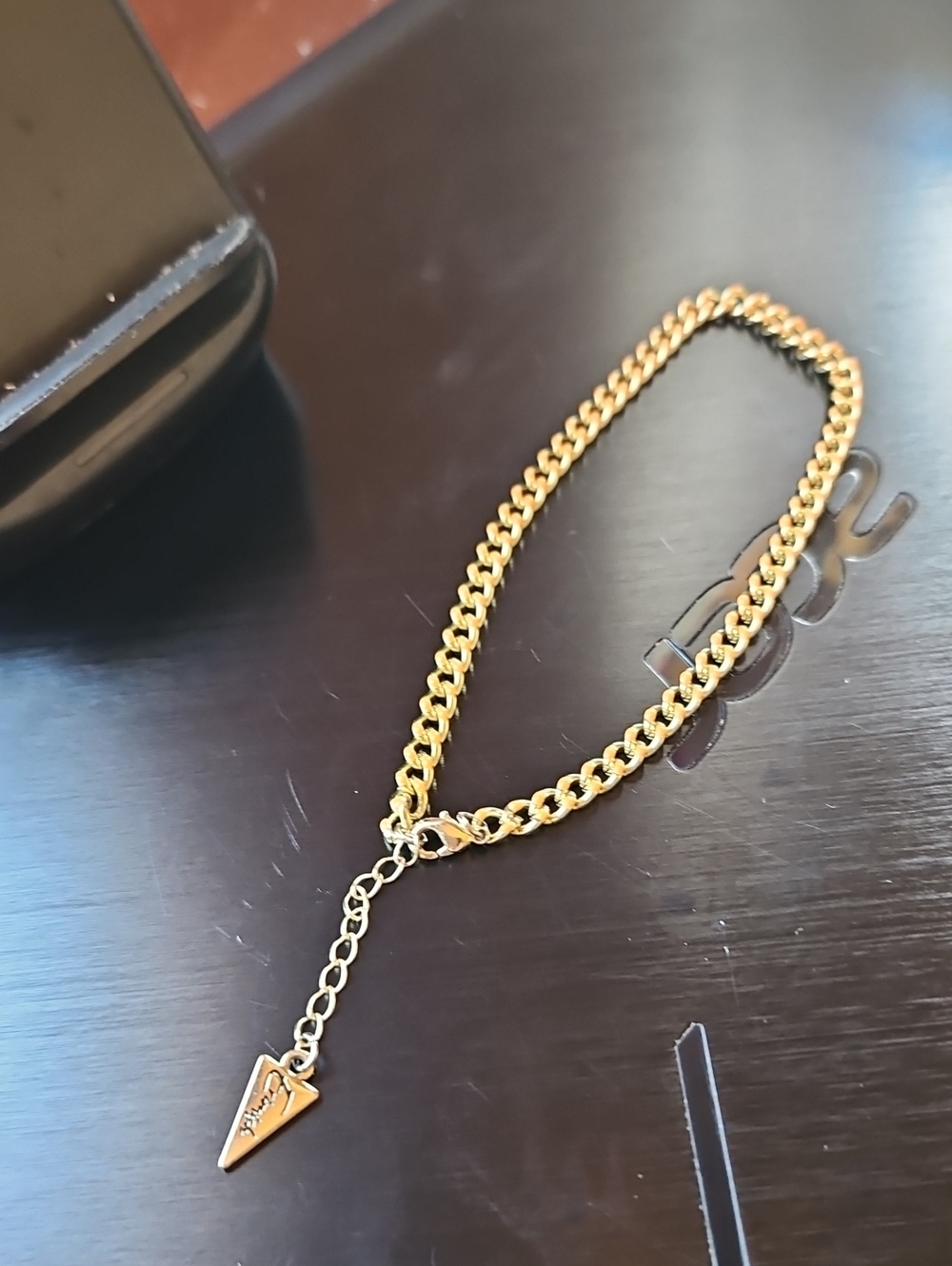 Men’s Gold Curb Chain Bracelet with Arrow Pendant